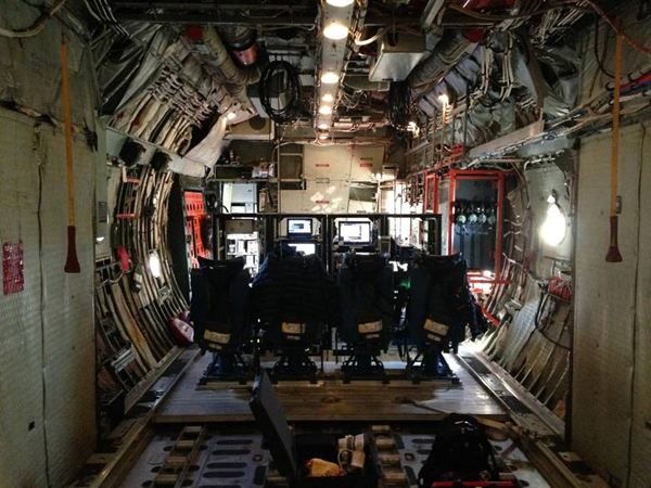 Interior of the plane showing the science station. The racks contain all computer and other equipment to control and monitor the two LVISs (Credit: The LVIS team)