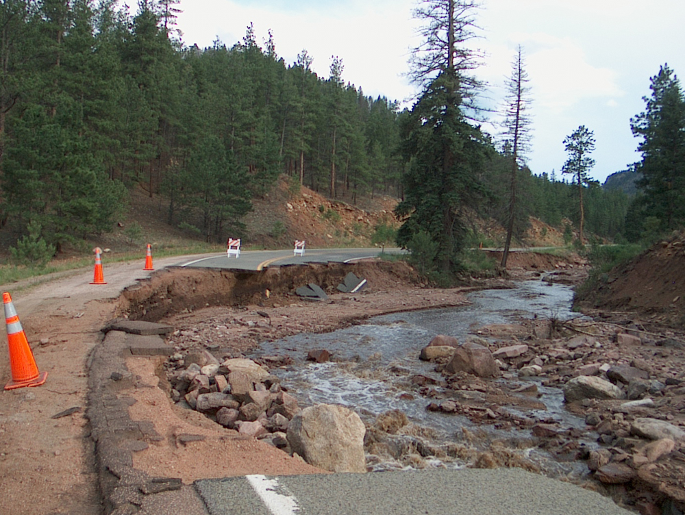 A 2006 flood spurred by runoff from the Hayman area caused millions in damage to a local highway (Credit: Michael Stevens/USGS)