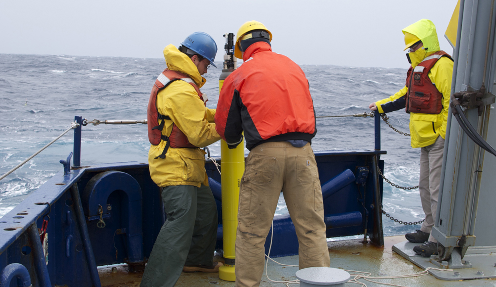Scientists ready a profiler on a research vessel in the Anarctic (Credit: Annie Wong/UW)