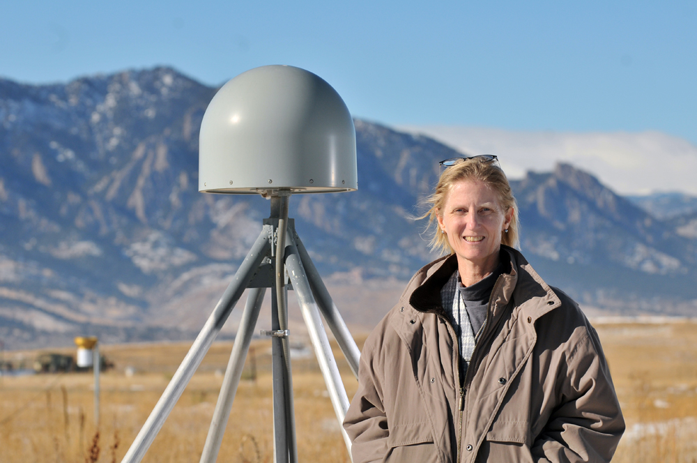 Kristine Larson stands by the GPS station where their methods were first proven. (Photo by Glenn J. Asakawa/University of Colorado)