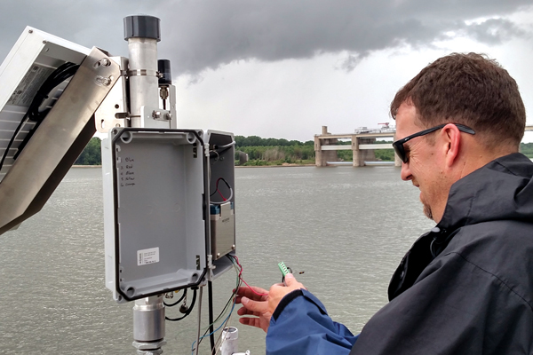 Installation of a NexSens 3100-iSIC Data Logger at Newburgh Locks and Dam on the Ohio River. (Credit: Greg Youngstrom, ORSANCO)