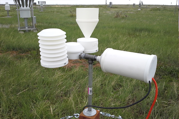 A 3D-printed weather station sits in a test field. (Credit: Martin Steinson, University Corporation for Atmospheric Research)