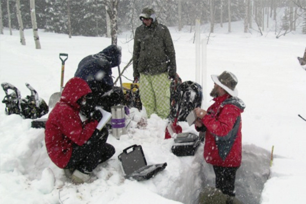 Colorado State University’s snow lab group takes measurements in Colorado. (Credit: Ryan Webb)