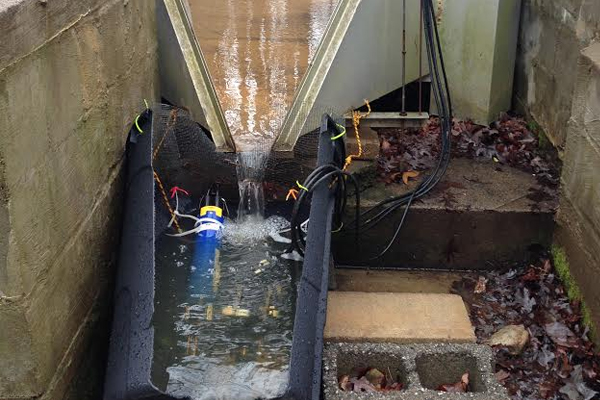 Picture of the in-stream monitoring equipment at the headwater watershed flume outlet. (Credit: Maggie Zimmer / Duke University)