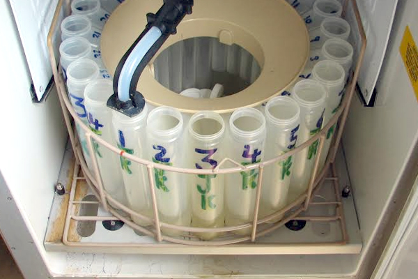 Bottles sit inside an automated sampler. (Credit: National Center for Water Quality Research)