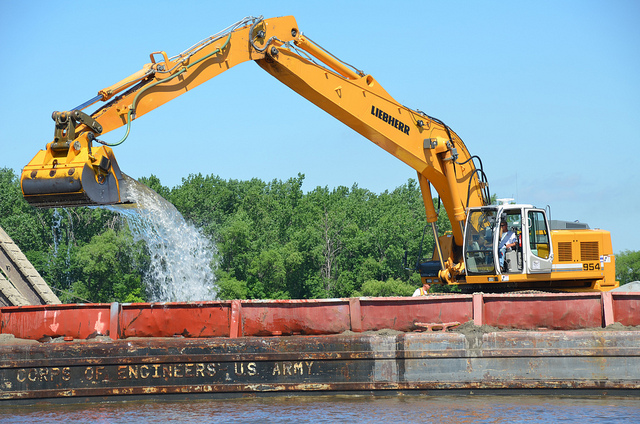 Dredging can cause turbidity levels to spike in a river as sediment is stirred up. Photo Credit: USACE St Paul District, via Flickr.