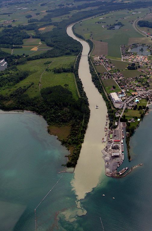 Sediment transported down the Rhone River into Lake Geneva can be detrimental to the lake quality. (Photo Credit: Rama, 2007, via Wikimedia)