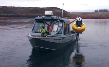 Deploying a data buoy.