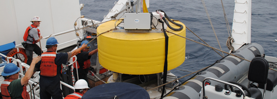 A crew deploys an Environmental Sample Processor as part of the Monterey Bay Aquarium Research Institute CANON project (Credit: Alba Marina Cobo Viveros)