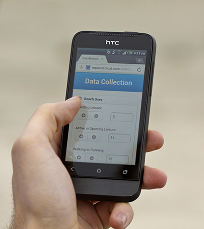 Volunteers enter data into the app's electronic forms (Credit: UC San Diego)