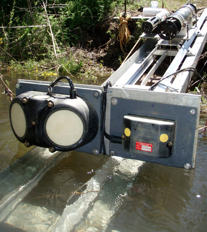 Sediment surrogate devices, including two acoustic Doppler velocity meters, that were mounted on a track for deployment in the Clearwater River. (Credit: Molly Wood)