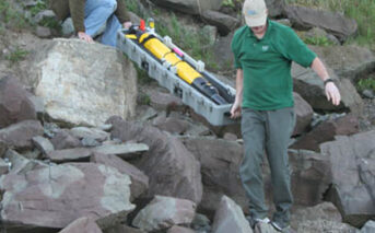 Two autonomous underwater vehicles launch in Lake Ontario