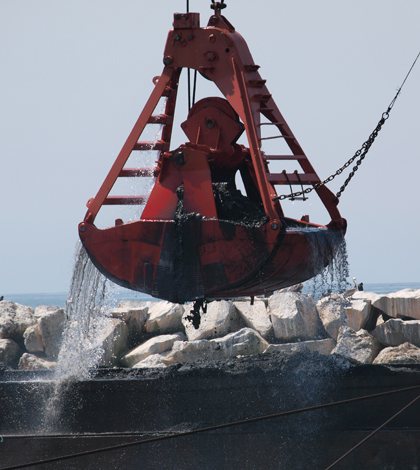 A clamshell dredge in action (Credit: U.S. Army Corps of Engineers)