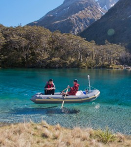 Chris Appleby and Rob Merrilees in the NIWA research vessel in transit to a Blue Lake sampling station (Credit: Mark Gall)