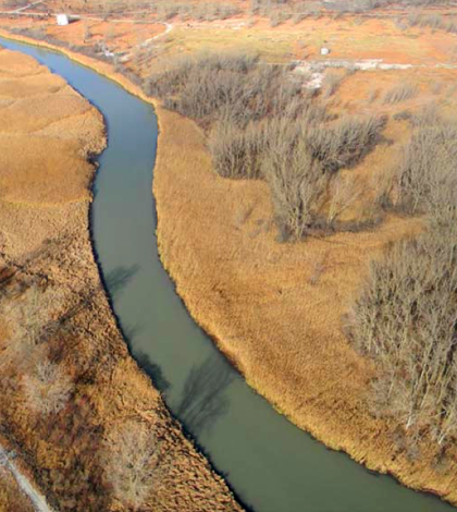 A segment of the East Branch Grand Calumet River near where dredging is underway to remove contaminated sediments. (Credit: SulTRAC)