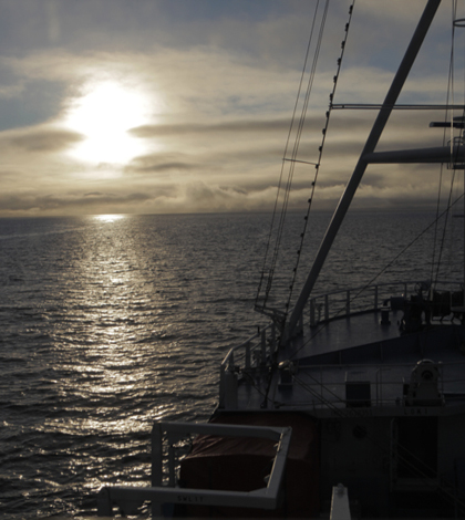 Low Arctic sun as seen from the R/V Lance (Credit: WHOI)