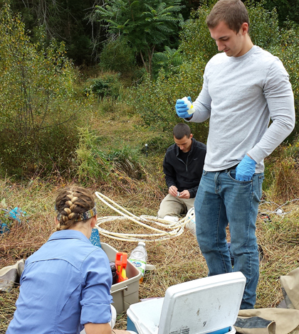 Students collect water samples at Lake Perez (Credit: Penn State University)