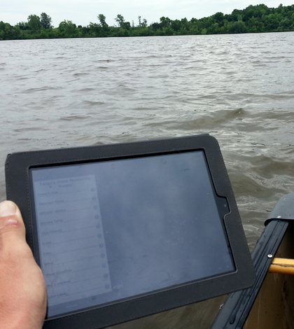 An iPad and GIS application in use while sampling on a Carver County lake (Credit: Charlie Sawdey)