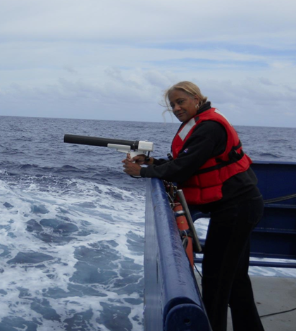 Jacquelyn Hams aboard the R/V Revelle in the Indian ocean with an XBT, a torpedo gun-like instrument for measuring ocean thermoclines