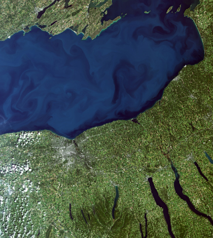 Landsat 8 images of Lake Ontario can show sediment patterns as well as potentially problematic algae. (Credit: NASA/USGS)