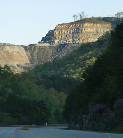 Leftover debris from mountaintop removal mines, like this one in Kentucky, is piled and revegetated in nearby valley fills (Credit: iLoveMountains.org via Wikimedia Commons)