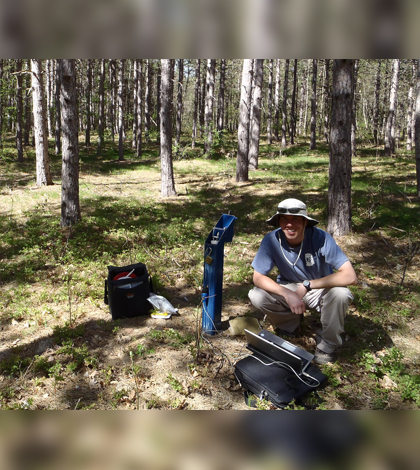 Former USI undergrad Chanse Ford at savanna restoration monitoring site in the Mansitee National Forest, Michigan. (Credit: Paul Doss)