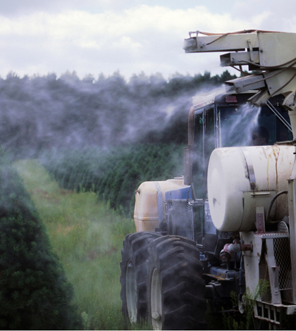 Pesticide application at a Wisconsin Christmas tree farm (Credit: Wisconsin DNR, via Flicker/CC BY-ND 2.0)