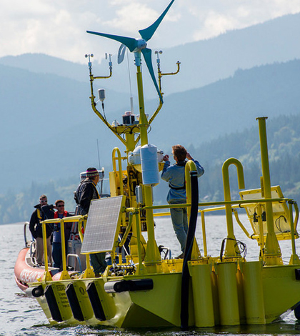 Laboratory staff test one of the two new buoys in Sequim Bay, Washington, before their deployments to measure offshore wind (Credit: Pacific Northwest National Laboratory)