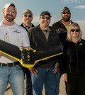 Scientists at the Wright State Research Institute display one of their UAS aircraft. (Credit: Wright State University)