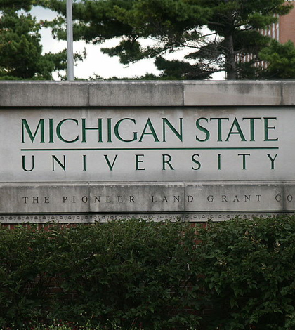 Michigan State University sign on campus. (Credit: Branislav Odrasik)