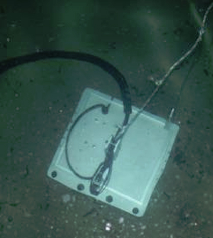 The Acoustic Slick Thickness ROV moves in a research tank on the campus of the Virginia Institute of Marine Science. (Credit: David Malmquist)