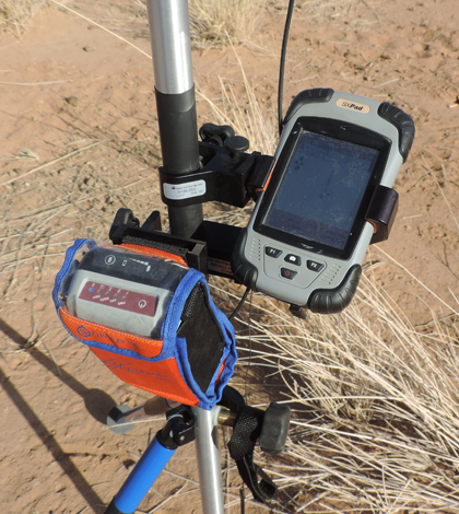 Geneq SXPad Rugged Handheld Computer and SXBlue GPS Receiver. (Credit: Thomas Bell / Pan African Minerals)