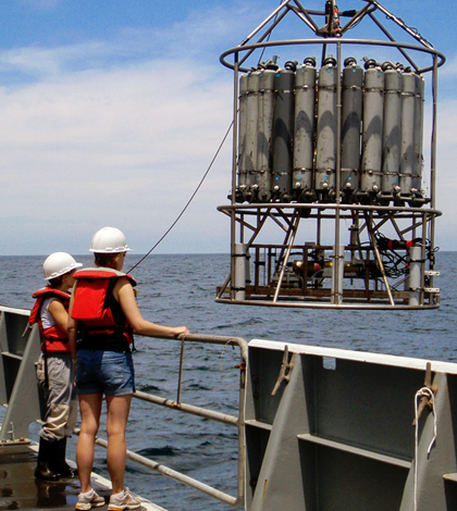 Scientists sample water at multiple depths to quantify cycling nitrous oxide in the ocean. (Credit: Clara Fuchsman)