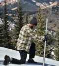 John Mickey, a field technician, takes a snowpack measurement. (Credit: National Center for Atmospheric Research)