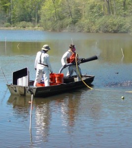 Deployment of bio-amended activated carbon pellets (SediMite) to treat PCB contaminated sediment in Abram’s Creek on the Quantico Marine Base. (Credit: Kevin Sowers)