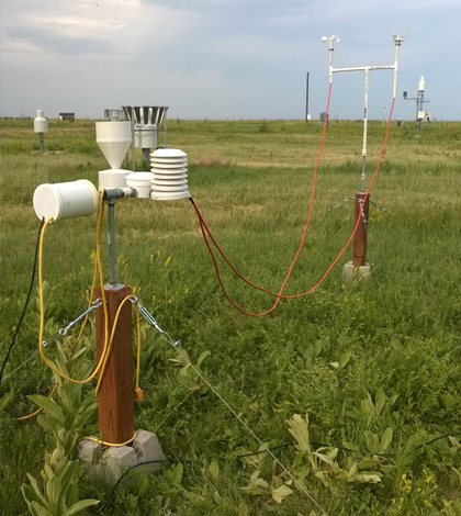 A 3D-printed weather station sits in a test field. (Credit: Martin Steinson, University Corporation for Atmospheric Research)