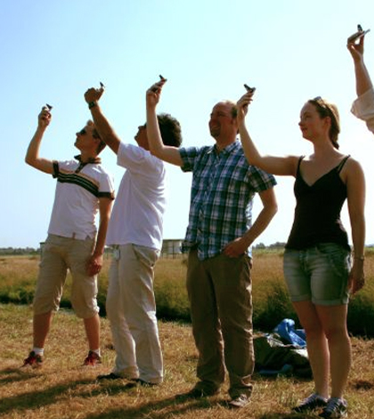 Team members of the Dutch iSPEX-project performing an iSPEX measurement. (Courtesy of Leiden University)