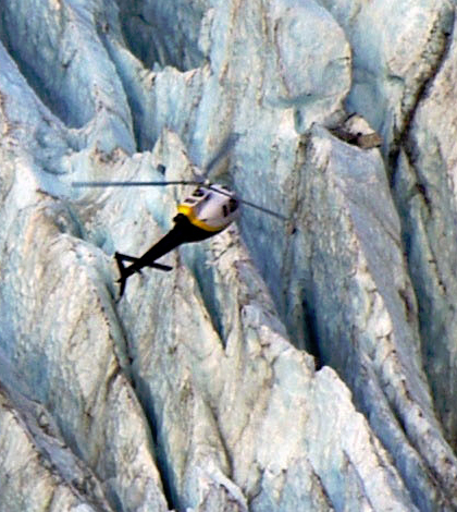 A helicopter takes researchers up to the Franz Josef Glacier in New Zealand. (Credit: Benjamin Lehmann)