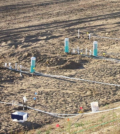 Instrumentation at a managed aquifer recharge site when conditions are dry. Samplers help to recover fluids. Sensors and loggers help to determine infiltration rates. (Credit: Andrew Fisher / University of California, Santa Cruz)