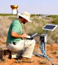 Laureano Gherardi, an ASU School of Life Sciences postdoctoral research associate, takes measurements during a six-year study on grasslands and the effects of weather extremes. (Credit: Osvaldo Sala / Arizona State University)