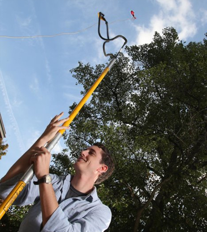 Purdue students are hoping to improve climate change models by collecting leaf samples. (Credit: Tom Campbell / Purdue University)