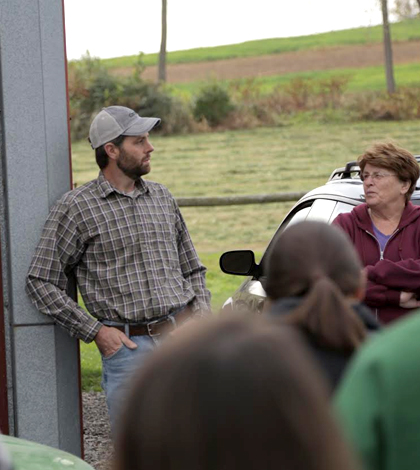 A farmer talks with Bucknell University students about runoff coming from his land. (Credit: Bucknell University)