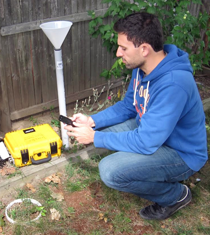 Steve Decina with LI-COR automated soil efflux system. (Credit: Steve Decina)