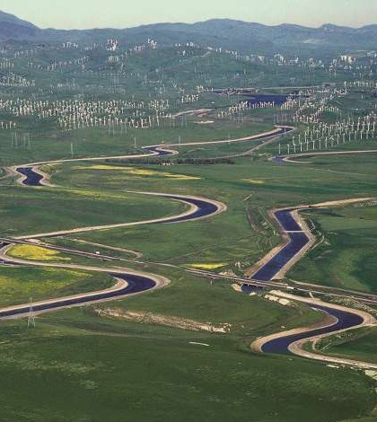 The California Aqueduct (left) and the Delta-Mendota Canal (right) wind through California's Central Valley. (Credit: U.S. Department of the Interior)