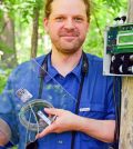 Dan Mennill, senior author on the U. of Windsor research, holds a nocturnal flight call microphone used to survey avian biodiversity during migration. Image credit: (C. Sanders)