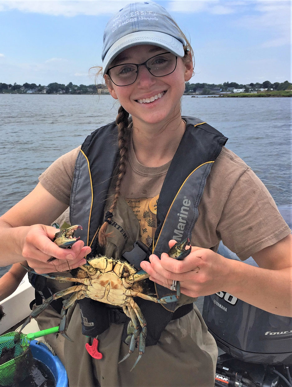 Heather Kinney holding a blue crab