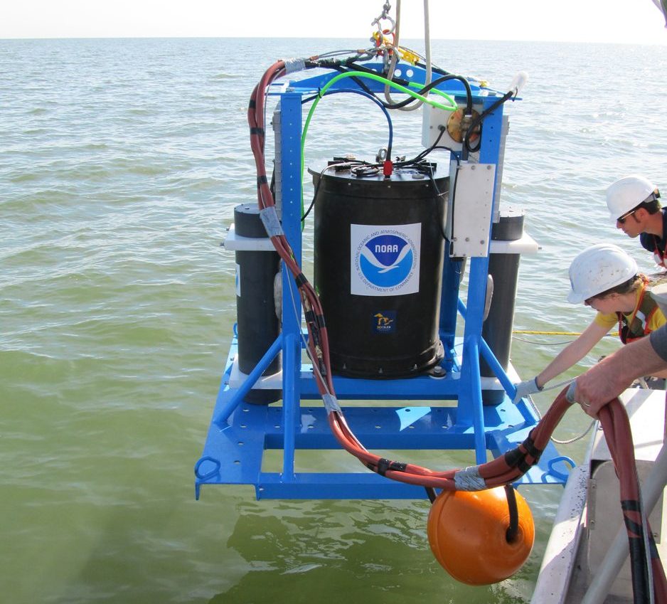 NOAA GLERL's Environmental Sample Processor (ESP) test deployment, June 2016. The "ESPniagara," aptly named for its use in a Great Lakes system, is a "lab in a can" that tracks the levels of dangerous toxins produced by cyanobacteria that bloom each summer in the western basin of Lake Erie.