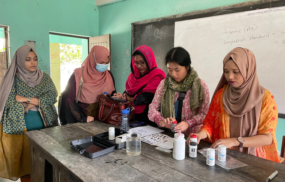 Volunteers from Chemists Without Borders during a training session at Teriail High School in Bangladesh. The volunteers conducted surveys of local residents, participated in focus groups of the local community, and tested wells for arsenic.