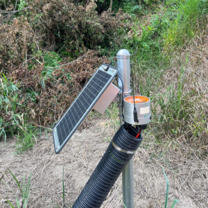 Upper Scioto River nutrient sampling site in Kenton, OH. This site does not have a building, so the X2 data logger and sondes, located down in the river, are powered by the solar panel.