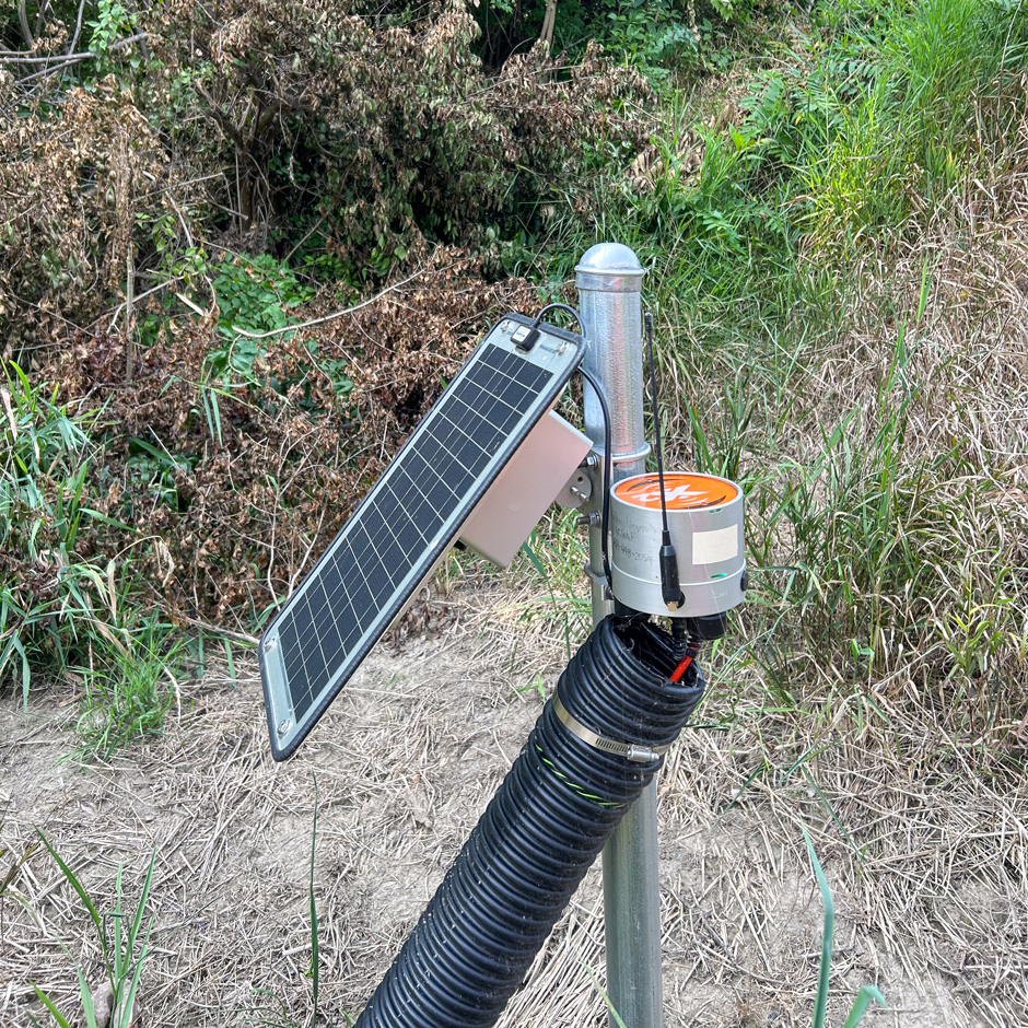 Upper Scioto River nutrient sampling site in Kenton, OH. This site does not have a building, so the X2 data logger and sondes, located down in the river, are powered by the solar panel.